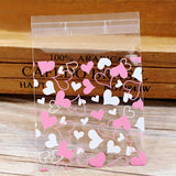 Lkblock 50pcs Cute Cartoon Plastic Bag Wedding Birthday Party Favors Cookie Candy Gift Packaging Bags OPP Self Adhesive Pouch Bags